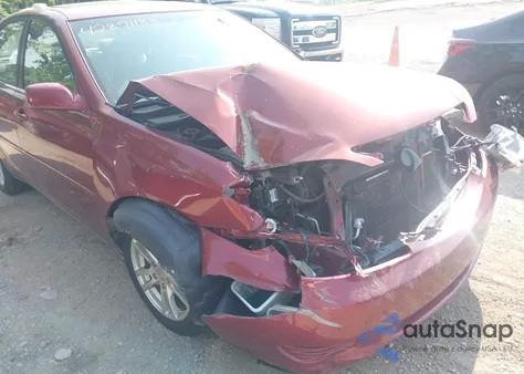 2005 Toyota Camry Le z USA, uszkodzony, nr VIN 4T1BE32KX5U426297